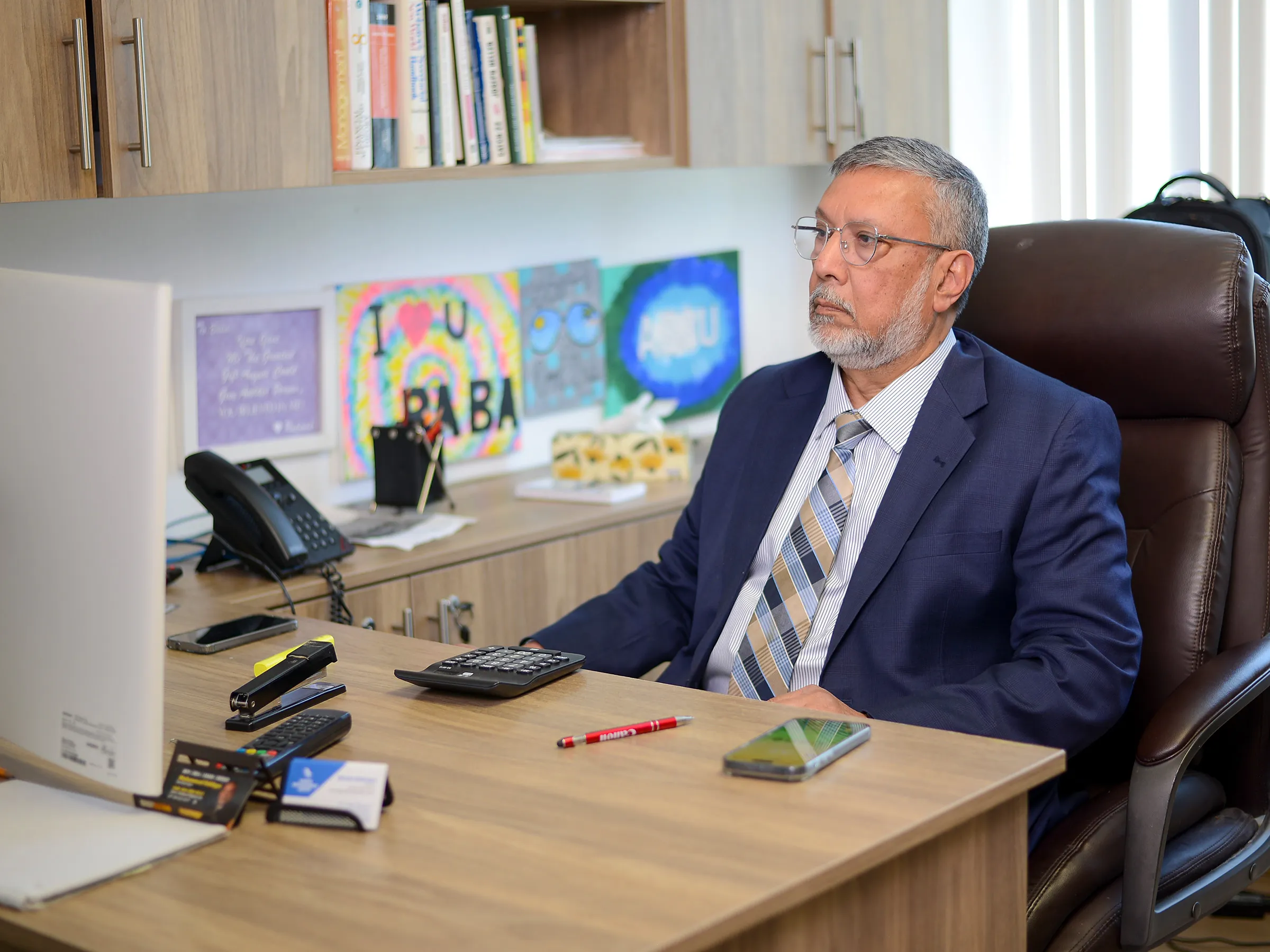 Irfan preparing a personal return at his desk